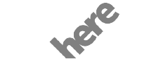 Here logo escala de grises